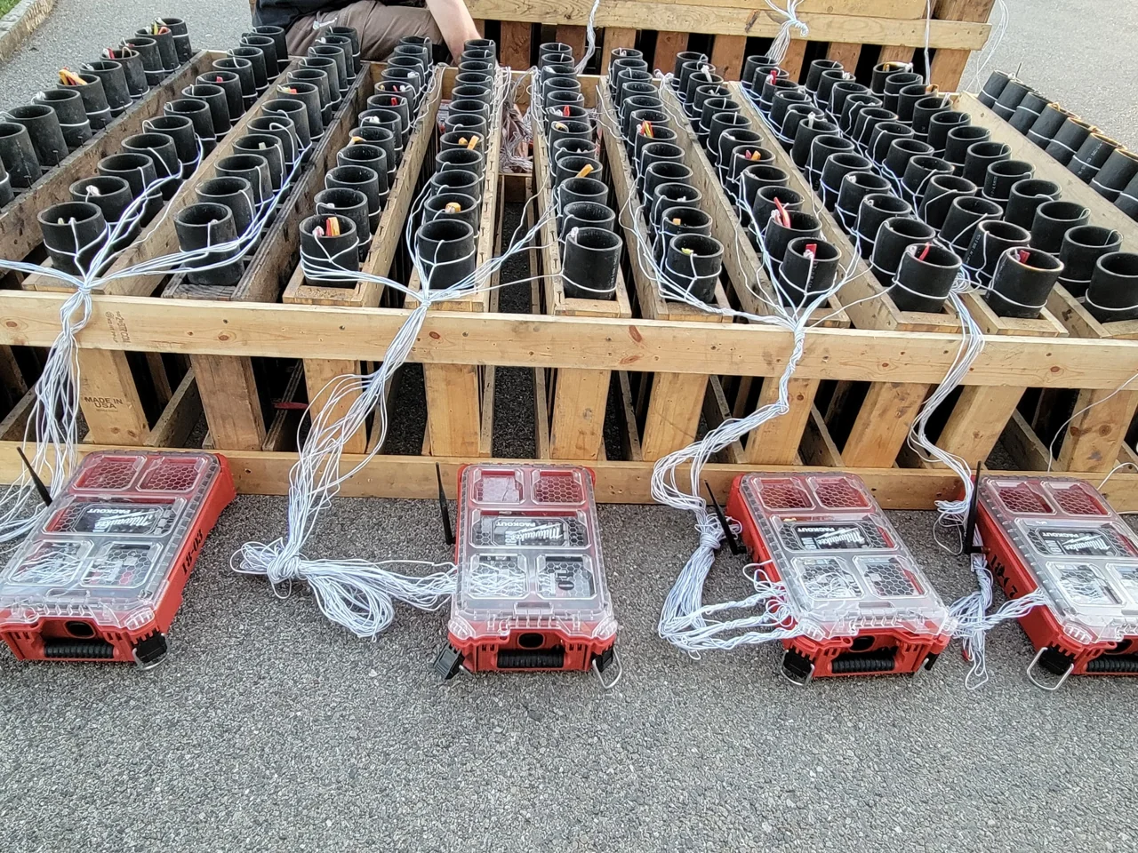 Computerized firing modules connected to pyrotechnic racks